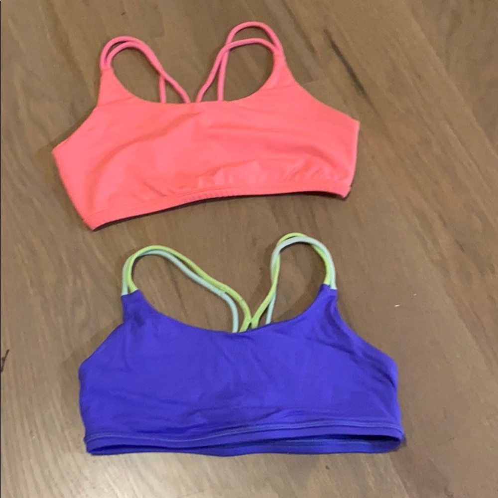 Two Ivivva Sports bras